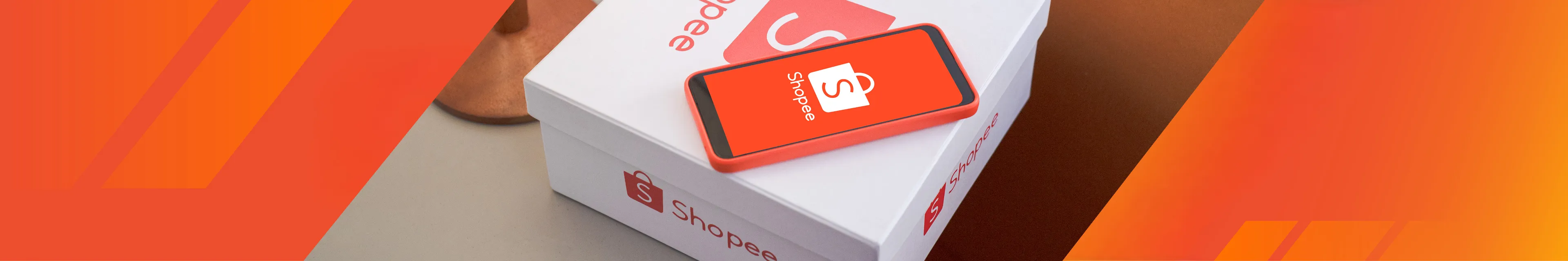 A mobile in Shopee page above a Shopee package